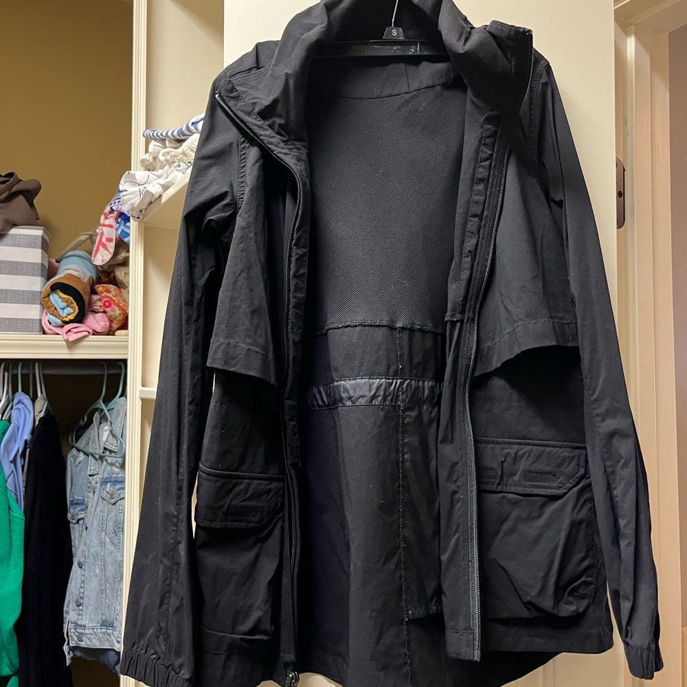 Small, Northface black windbreaker